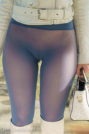 Beauty Jeny without panties and skirt poses in her blue seamless pantyhose outside